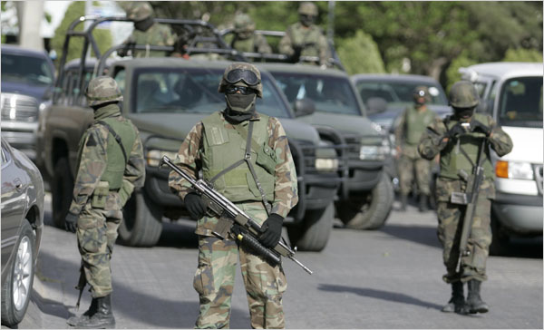 Mayor, police officers flee Mexican town following massacre