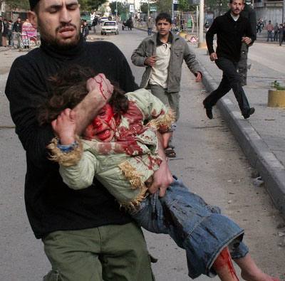 2ND LEAD: At least 42 killed in Israeli army strike on Gaza school 
