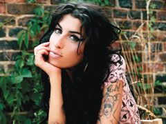 Winehouse, Blake get lovey-dovey on Facebook