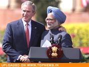 Bush assures Manmohan Singh on nuclear deal