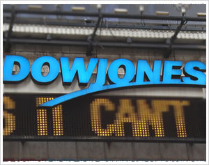 Dow climbs back over 10,000 on upbeat economic data