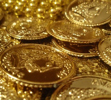 Gold slides by Rs. 75 on weak overseas market cues