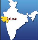 Gujarat Minister declared wanted by Special Investigating Team