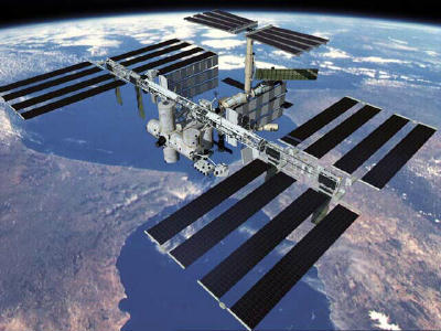 Discovery docks with International Space Station