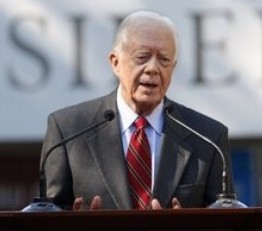 Carter backtracks on Obama critics racist claim