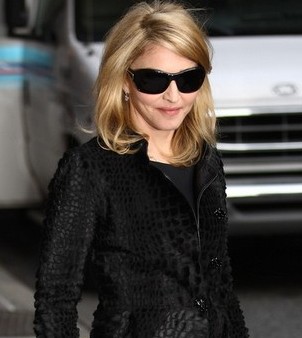 Madonna laughs off marriage claims