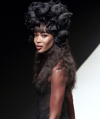 Naomi Campbell nips out during Paris Fashion Week