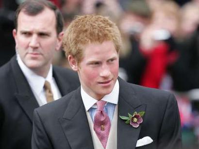 Prince Harry zooms down country lanes in his mega bike