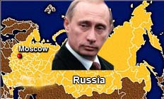 Putin in Libya for talks on energy and arms