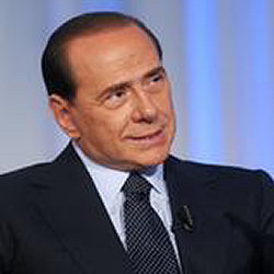 Bandaged Berlusconi leaves hospital