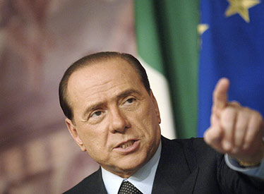 Italian Prime Minister Berlusconi bloodied by attacker