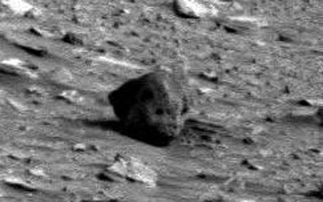 What does image sent by Spirit show; “Martian skull” or “Rock”?