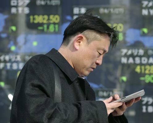 Tokyo shares end lower