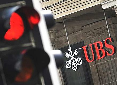 UBS reports continued losses for third quarter 