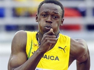 Bolt completes treble; but Wlodarczyk gets world record