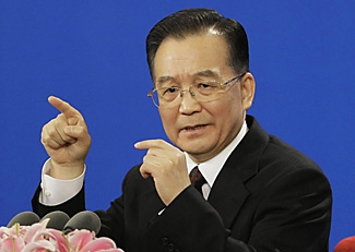 China's media silent on shoe throw protest against premier 