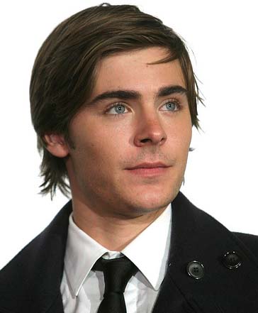 Tumbling Zac Efron apologises to airport security guard