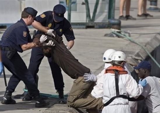 Eight African migrants die as rescued boat capsizes at port 