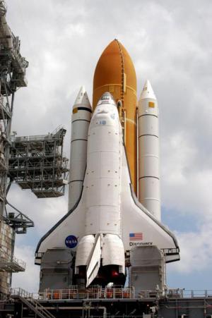 Discovery shuttle docks at space station