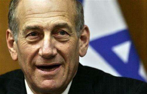 Israel will continue the peace process, Olmert tells Clinton 