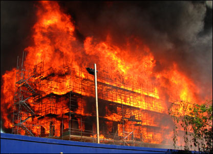 Firemen tackle blaze in office block in central London 