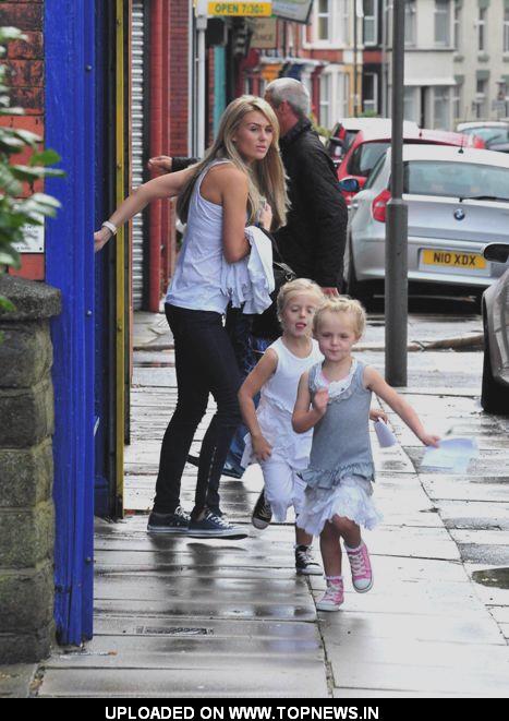 Alex Gerrard returns to her car after going to the hairdressers