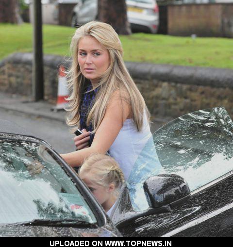Alex Gerrard returns to her car after going to the hairdressers