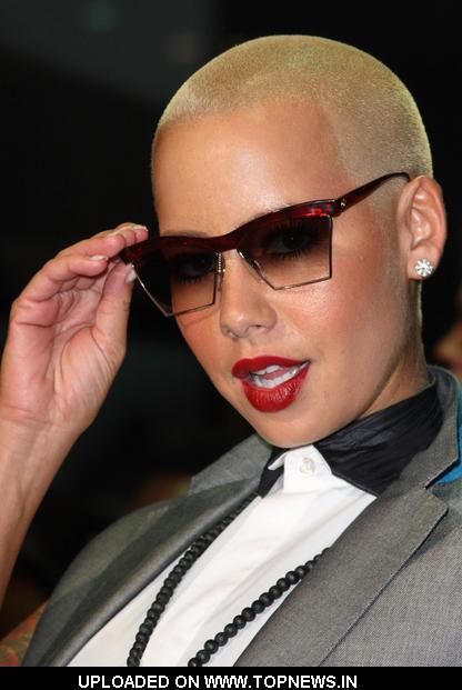 Amber Rose at London Fashion Week Spring Summer 2011 Ozwald Boateng 