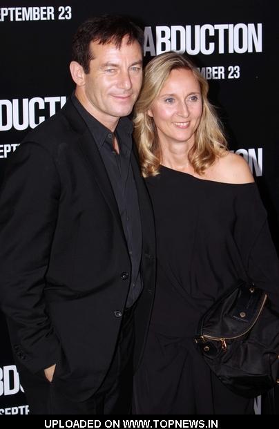 Jason Isaacs and Emma Hewitt at "Abduction" Hollywood Premiere - Arrivals    