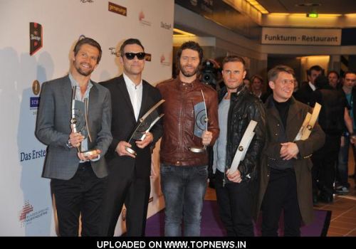 Jason Orange, Robbie Williams, Howard Donald, Gary Barlow and Mark Owen at Echo Awards 2011