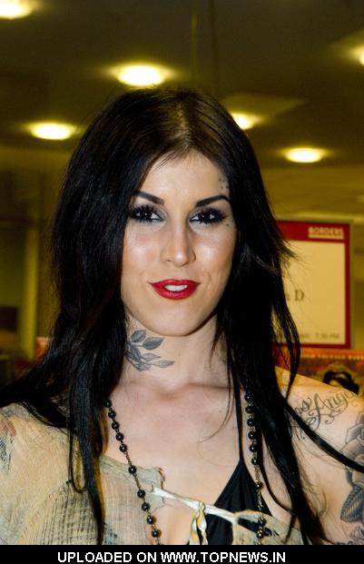 Kat Von D at Tattoo Artist Kat Von D Signs Copies of High voltage Tattoo