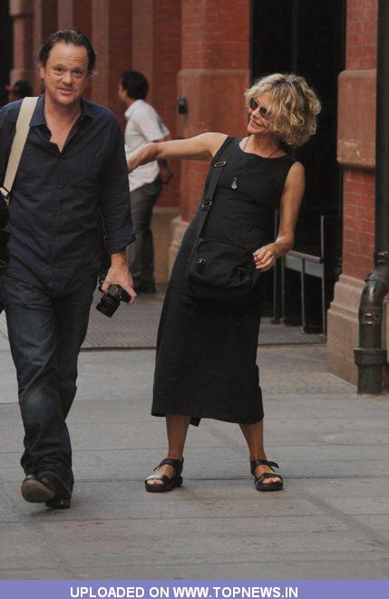 Meg Ryan is seen being affectionate with an unidentified man on the streets of Soho Meg Ryan is seen being affectionate with an unidentified man on the streets of Soho