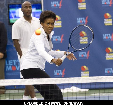 Michelle Obama Plays Tennis at the U.S. Open