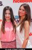 Miranda Cosgrove and Victoria Justice at Nickelodeon "iParty with Victorious" Premiere - Orange Carpet