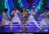 Rakhi Sawant dancing with hosts on  Bigg Boss 5 finale