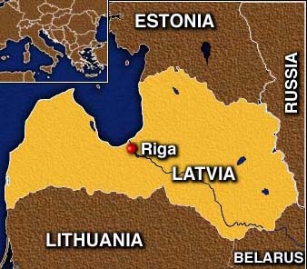 Latvian priest detained for smuggling phone in cake for prisoner 