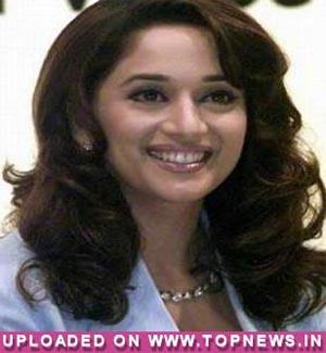 I don't feel weird about playing mother on screen: Madhuri Dixit