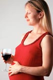 Pregnant woman drinking