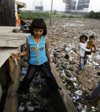 An NRI comes forward to help slum dog kid with her education