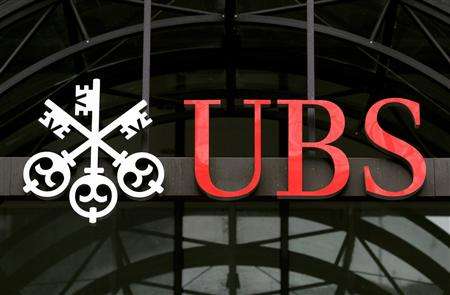 UBS stocks fall lower as bank vows to protect secrecy 