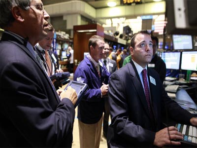 Wall Street gains ground on good news from crisis zones