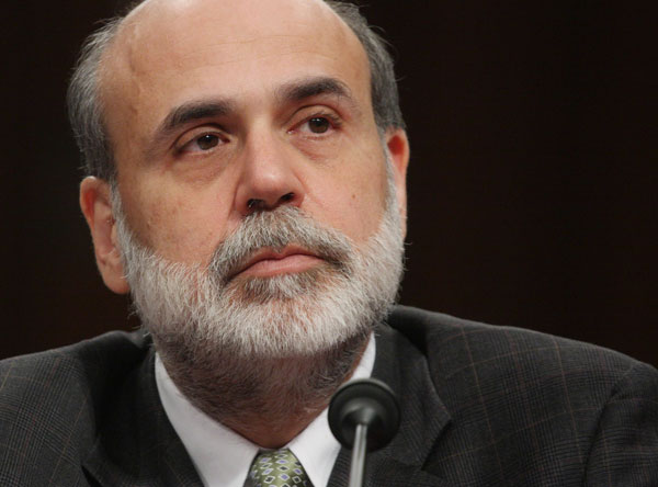 Wall Street mixed as Bernanke hints at end to rate cuts