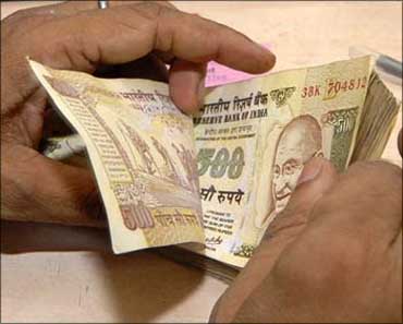 Indian rupee falls to new all time low of 55.09 against the US dollar