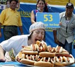 Japanese eating champ defeats American in devouring satay