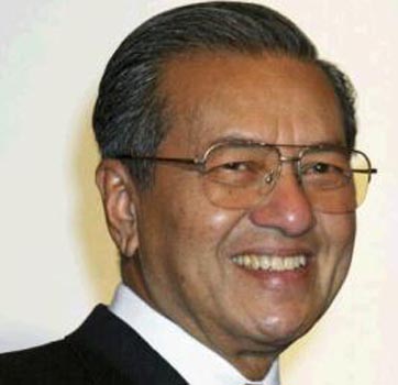 Malaysia's former leader Mahathir rejoins ruling party 