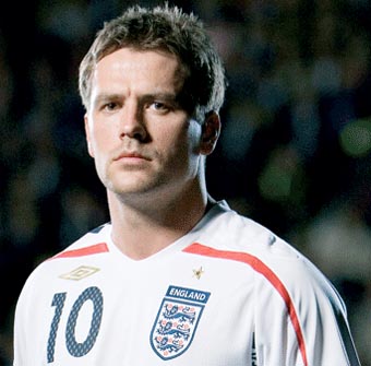 Football star Owen told to choose between playing for England or racing