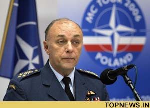 Amidst controversy, France returns to NATO military command