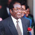 Mugabe threatens to break off talks with opposition