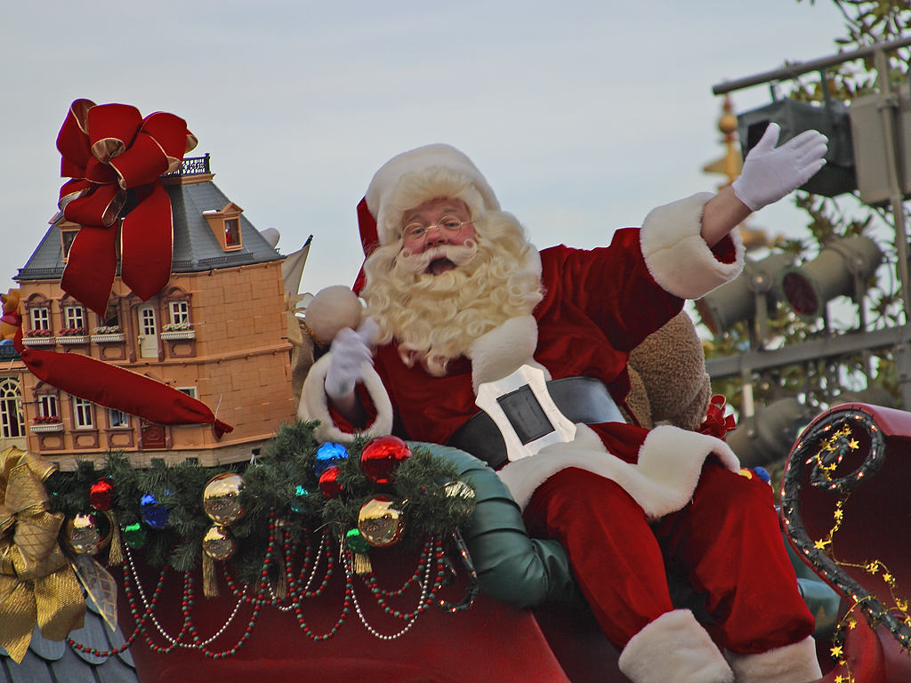 Beefy-arms Santa flings trees aboard ships 