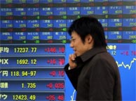 Tokyo stocks fall ahead of US firms' earnings reports 